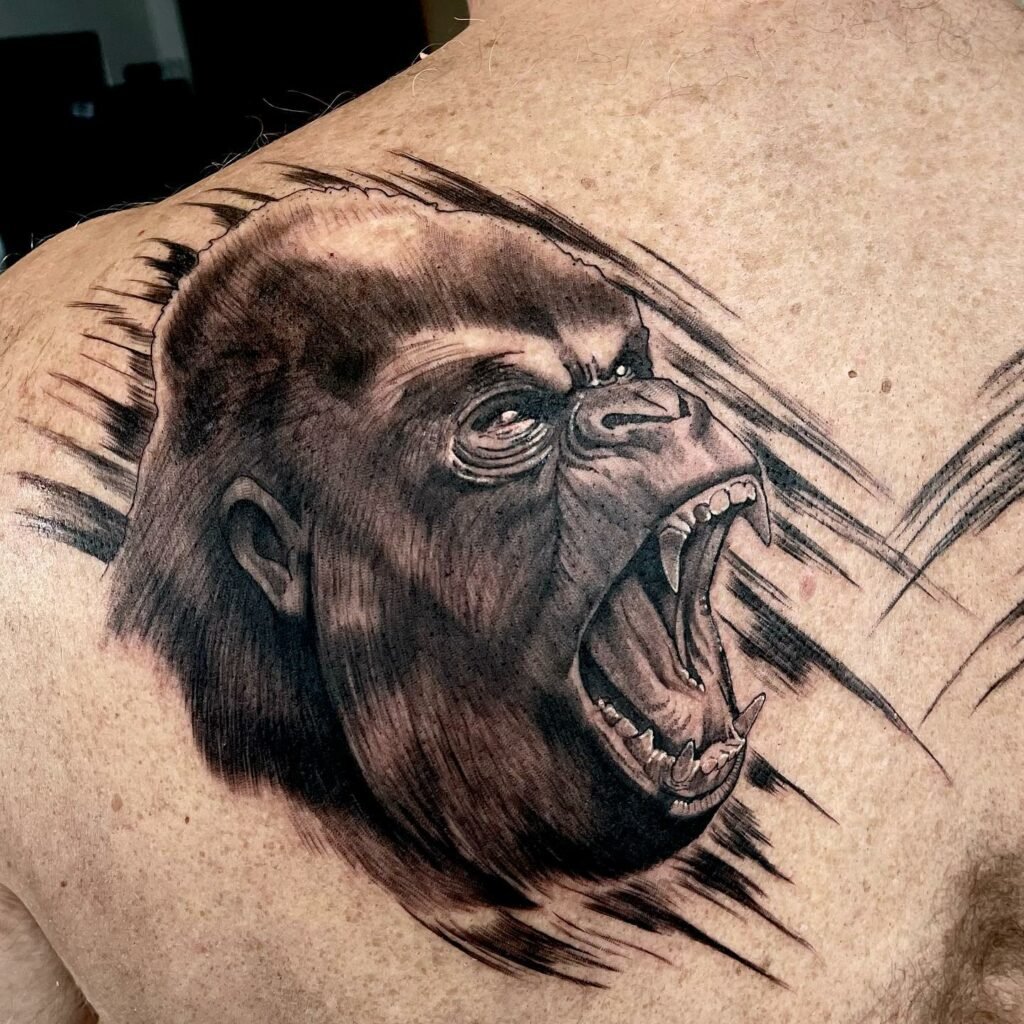 Chimpanzee Faced Back Black And White Tattoo